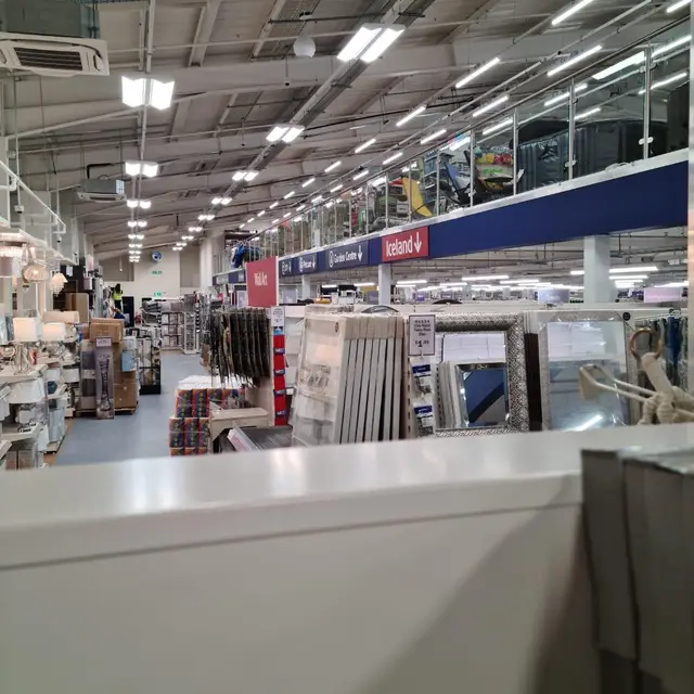 Homeware store mezzanine with painted steelwork and balustrade