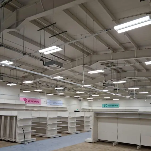 Retail store refit with painted ceiling and new shelving